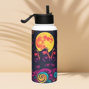 May include: A white stainless steel water bottle with a black lid and a straw. The bottle features a colorful psychedelic design with three bears looking up at a large yellow moon.