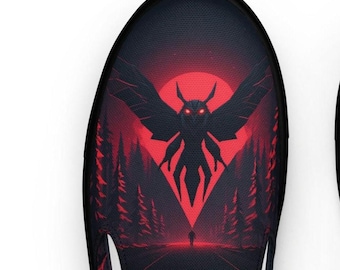 May include: A pair of black slip-on canvas shoes with a red and black graphic print of a large moth with glowing eyes flying over a dark forest path. The moth is silhouetted against a red moon.