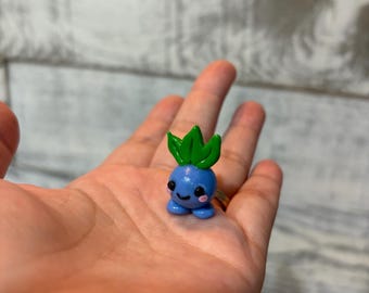 Handmade Polymer Clay Miniature Oddish Figurine. Pokémon Inspired.