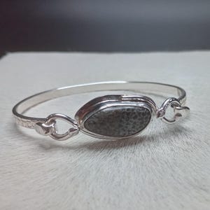 12.6ct Fossilized Black Coral Snake Sterling Silver Tension Bracelet