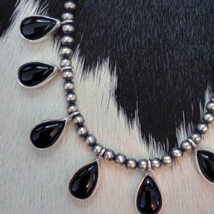 Shadows- Handcrafted Sterling Silver Necklace with 9 Pear-shaped Natural Onyx Stones and Navajo Pearl Beads