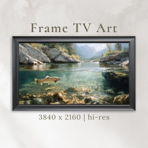 May include: A framed digital art print featuring a detailed underwater scene with a trout swimming in a clear river. The artwork includes a view of the riverbed and the distant mountains. The text "Frame TV Art" is at the top.