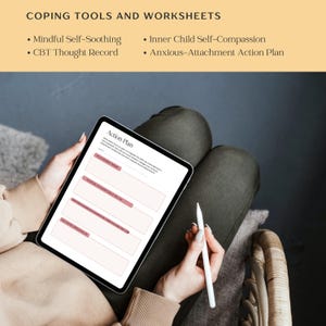 May include: A person is holding a tablet with a worksheet titled "Action Plan". The worksheet has four sections with lines for writing. The worksheet is for coping tools and worksheets.