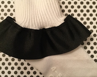 Calcetines con volantes y lazo negro