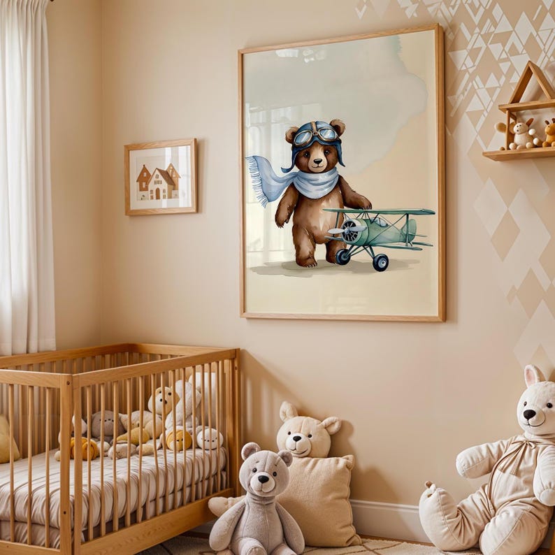 Set of 3 digital nursery prints featuring an aviator bear, vintage biplanes, and cozy airplane hangar scenes. Perfect for an aviator nursery, airplane nursery, baby boy travel room, pilot baby room, vintage nursery decor, and adventure-themed baby rooms. Ideal wall art for baby showers, nursery wall displays, and cozy baby room corners. Soft neutral colors with a classic vintage aviation theme.