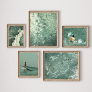 Set of 10 sage green ocean digital prints featuring tiny people swimming, aerial surfers, beach waves, and surfboard wall art. This beachy wall art collection brings a calm, coastal vibe to any space. Perfect for sage green wall art themes, surf-inspired decor, tiny people art collectors, and summer homes. Includes aerial beach prints, surfer wall art, and ocean photography designed for minimalist, coastal, and sage green interiors.