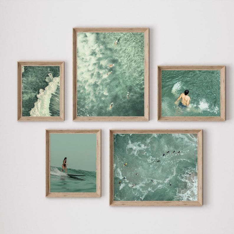 Set of 10 sage green ocean digital prints featuring tiny people swimming, aerial surfers, beach waves, and surfboard wall art. This beachy wall art collection brings a calm, coastal vibe to any space. Perfect for sage green wall art themes, surf-inspired decor, tiny people art collectors, and summer homes. Includes aerial beach prints, surfer wall art, and ocean photography designed for minimalist, coastal, and sage green interiors.