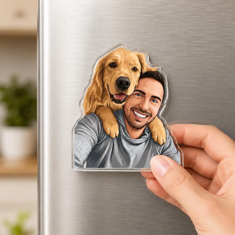 May include: A clear acrylic magnet featuring a smiling man and a golden retriever dog. The dog is positioned behind the man, with its head resting on his shoulder. The man is wearing a gray hoodie.