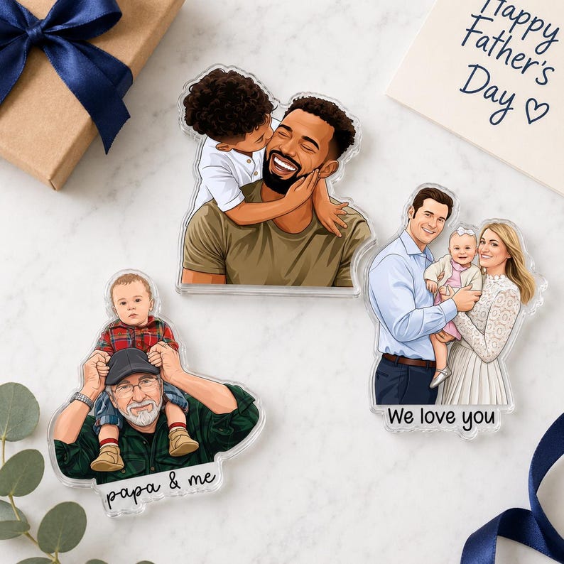 May include: Acrylic family portraits featuring illustrations of fathers with their children. One shows a father being kissed by his son, another shows a father with his daughter, and the last shows a grandfather with his grandson. The words "Happy Father's Day" are on a card.