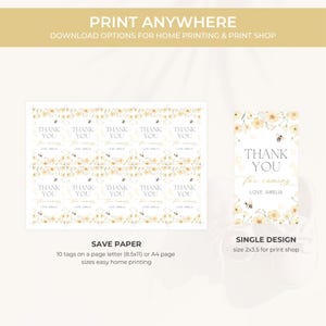 May include: Printable thank you tags with a floral and bee design. The tags read "Thank You for coming, Love Amelia." The image shows a sheet of tags and a single tag. The text "Print Anywhere" is at the top.