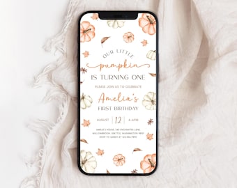 May include: A smartphone displays a digital invitation for Amelia's first birthday. The design features watercolor pumpkins, leaves, and text that reads "Our Little Pumpkin is Turning One." The invitation includes the date, time, and location.
