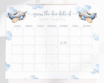 May include: A blue and white baby shower game with a calendar for guests to guess the due date of Baby Martin. The calendar is decorated with clouds and airplanes.
