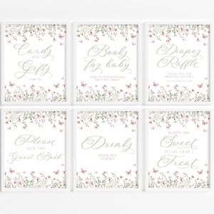 May include: Six printable signs with a floral and butterfly design. The signs say "Cards and Gifts", "Books for Baby", "Diaper Raffle", "Please Sign the Guest Book", "Drinks", and "Babies are Sweet, Please Grab a Treat".