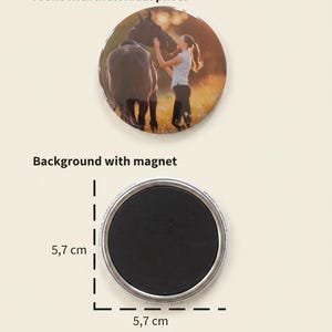 May include: A circular magnet measuring 5.7 cm by 5.7 cm. The front displays a photographic print of a person standing next to a horse in a field at sunset. The back features a solid black circular magnet with the text Made in Germany printed.