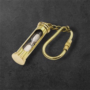 Personlig nyckelring med sandtimer