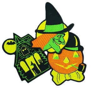 May include: Embroidered Halloween patches featuring a haunted house, a witch with orange hair and a black hat, and a jack-o'-lantern with a pipe. The patches have a black border and are in shades of green, yellow, and orange.