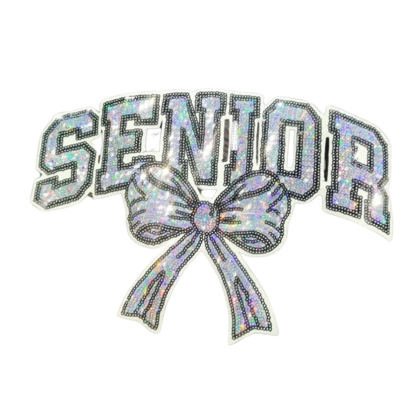 May include: A silver sequined "SENIOR" sash with a large bow. The text is outlined in black and filled with iridescent sequins. The bow is also silver and sequined, with black outlining.