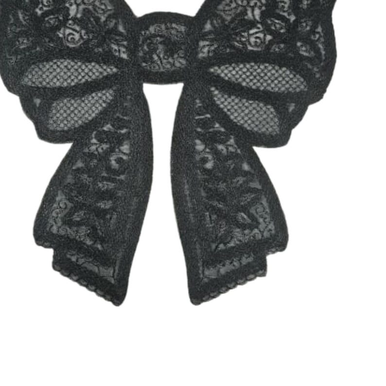 May include: Black lace bow with intricate floral patterns. The bow is a decorative accessory, likely for hair or clothing, with a delicate, openwork design. The bow's shape is symmetrical, with two large loops and two tails.