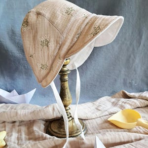 Reversible baby sun hat in organic cotton
