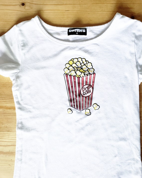 AwEsOmE 1990s Smellies Popcorn Scratch n Sniff Tee