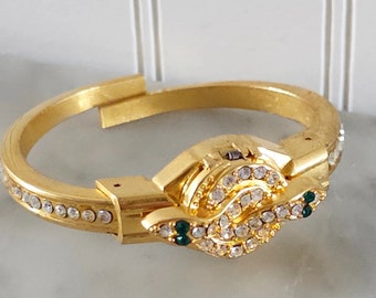 Increíble pulsera de traje de reloj de oro de serpiente de ojos verdes Jacques Couture vintage