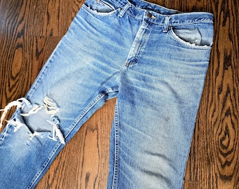 Amazing Vintage 1990s y2k LEE High Waisted Med to Light ripped torn  36x32 Denim Jeans