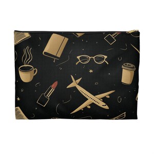 May include: Black travel pouch with a repeating pattern of tan travel and lifestyle icons. The design includes an airplane, coffee cup, lipstick, glasses, and a book. The pouch has a gold zip.