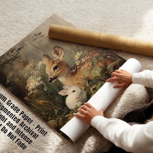 May include: A museum-grade print shows a fawn and a white rabbit in a woodland scene. The artwork is rolled with a brown tube and a white tube. The text on the print reads: Museum Grade Paper - Print with Pigmented Archival Inks, Bright and Intense Colors that Do Not Fade.