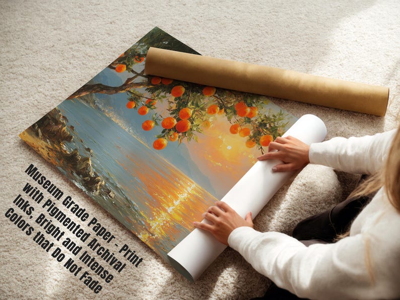 May include: A print on museum-grade paper depicts a landscape with orange fruit trees and a bright sunset. The print is rolled with a brown tube and a white tube. The text on the print says "Museum Grade Paper - Print with Pigmented Archival Inks, Bright and Intense Colors that Do Not Fade."