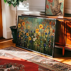 May include: A framed painting of a field of colorful wildflowers. The flowers are mostly yellow and blue, with some red and white flowers mixed in. The background is a soft green and blue.