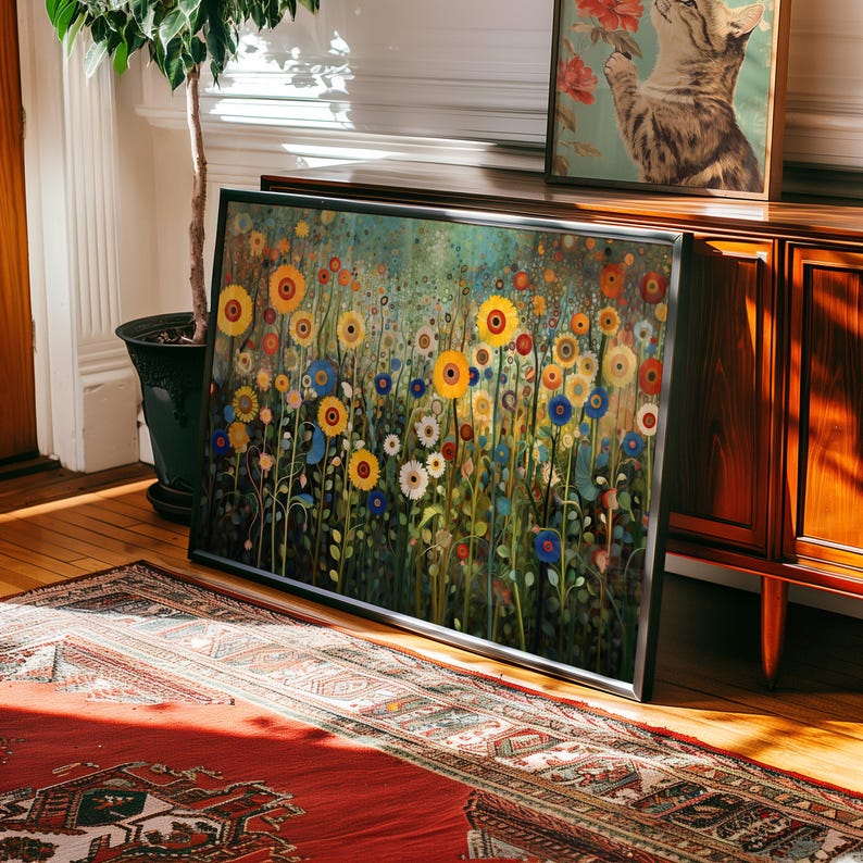 May include: A framed painting of a field of colorful wildflowers. The flowers are mostly yellow and blue, with some red and white flowers mixed in. The background is a soft green and blue.