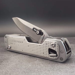 Dos pasadores/barras/pestañas para el pulgar para Leatherman Free T4/T2