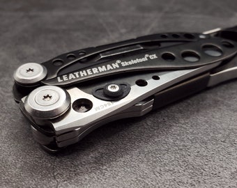 Dos pernos/barras/pestañas para el pulgar para Leatherman Skeletool - Herramienta Leatherman no incluida