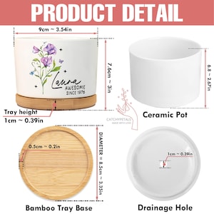 May include: A white ceramic pot with a floral design and the name "Laura". The pot is 3 inches tall and 3.54 inches wide, sitting on a bamboo tray base. The set includes a drainage hole and a separate ceramic pot.