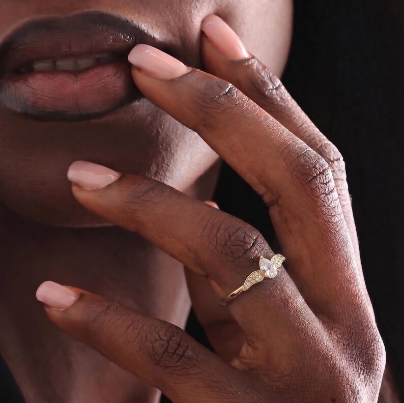 gold wing ring
simple promise ring
guardian angel ring
protection ring
angel wings ring
diamond angel ring
gold angel ring
tiny diamond ring
wedding ring
diamond wing ring
angel ring
angel wing ring
self-reminder gift
