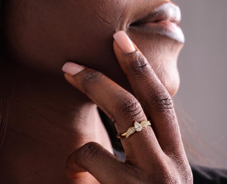 gold wing ring
simple promise ring
guardian angel ring
protection ring
angel wings ring
diamond angel ring
gold angel ring
tiny diamond ring
wedding ring
diamond wing ring
angel ring
angel wing ring
self-reminder gift