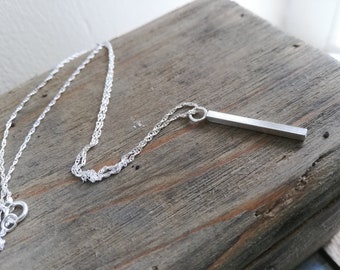 Silver geometric pendant by wocky metals beautifully simple.