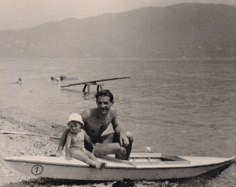 Vintage Black & White Photo - Man with a Child on a Canoe
