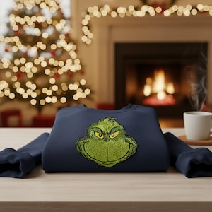 Embroidered Classic Grinch Face T-Shirt Funny Christmas Tee Grinch Embroidery Shirt Holiday Graphic Shirt Grinch Gift Idea Unisex Xmas Top