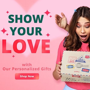 May include: A promotional image with the text "SHOW YOUR LOVE" in large letters. The image features a person holding a gift box with various stickers. The text "Our Personalized Gifts" and a "Shop Now" button are also present.