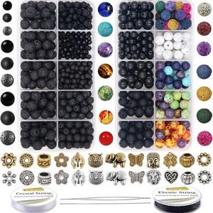 May include: A jewelry making kit featuring two clear plastic organizers filled with assorted black lava beads, smooth black beads, and colorful gemstone beads. Includes various gold and silver metal charms, two spools of elastic string, and needles.