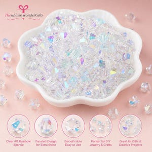 May include: A collection of clear, faceted crystal beads with an iridescent AB rainbow finish, contained within a white, flower-shaped dish. The beads feature a central hole and are displayed alongside five circular detail insets.