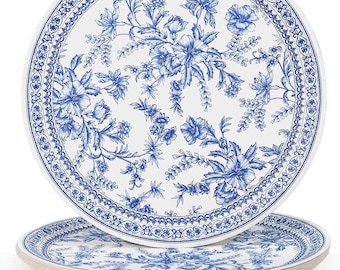 May include: Two round white plates with a blue floral design. The plates feature a detailed blue floral pattern with a decorative border. The plates are stacked on top of each other, showcasing the design.