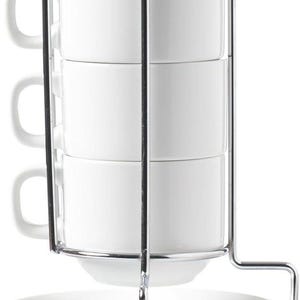 May include: A white porcelain teacup and saucer set, stacked in a chrome metal rack. The set includes four teacups and saucers. The teacups have handles. The rack is designed to hold the cups and saucers securely.