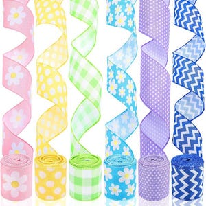 May include: A collection of colorful decorative ribbons in various patterns. The ribbons include floral, polka dot, gingham, and chevron designs in pink, yellow, green, blue, and purple. Each ribbon is rolled at the bottom.