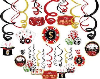 May include: Casino-themed party decorations featuring red dice, poker chips, playing cards, and swirling ribbons in black, red, and gold. Includes a magician's hat with rabbit ears and the text "The Winner".