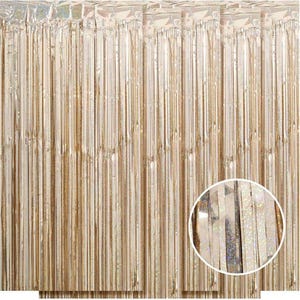 May include: A gold metallic fringe curtain backdrop for parties and events. The curtain is made of thin strips of shiny gold foil.
