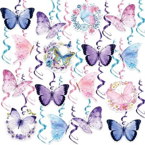 May include: A set of 15 butterfly swirl decorations. The decorations feature butterflies in various colors, including pink, blue, purple, and white. The butterflies are surrounded by floral designs and swirls.