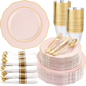 May include: A collection of pink disposable plates with gold trim, gold-colored cutlery, clear plastic cups with gold rims, and white napkins with gold stripes. The plates have a scalloped edge.