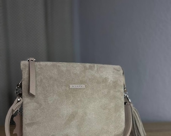 Elegant crossbody bag made of genuine suede in a beige color